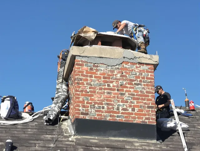 Security-Widefield Chimney Sweep installing a custom chimney crown in Security-Widefield, CO