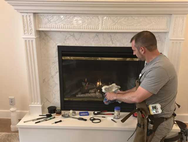 Security-Widefield Chimney Sweep performing fireplace maintenance in Security-Widefield, CO